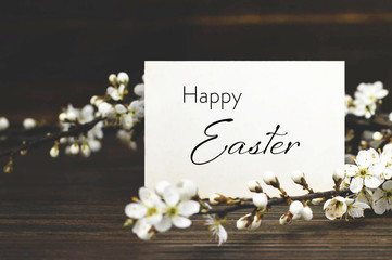 Fototapeta na wymiar Happy Easter card. Easter card and flowering branch