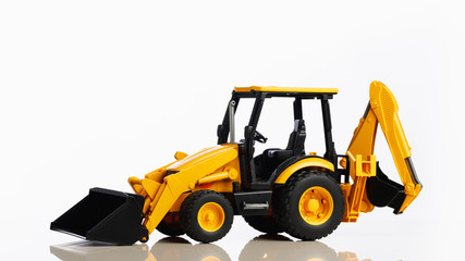 backhoe tractor toy, white background
