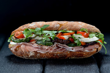 sandwich with sausage and vegetables