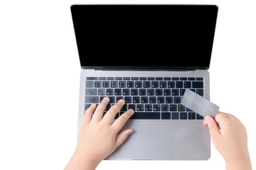 kid holding credit card   on laptop isolated