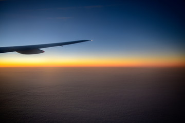 Beautiful sky in  evening from window airplane