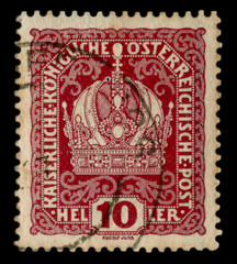 Austro-Hungarian Empire - circa 1914: Austrian historical stamp: Image of the Imperial crown with flower curls, cancellation, world war one 1914. Austria