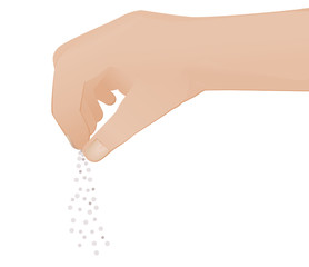 Main saupoudrant une petite quantité de grain