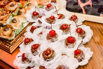 wedding candy table. delicious and assorted sweets. selective focus.