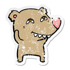 distressed sticker of a cartoon bear showing teeth