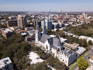Aerial view of downtown Savannah, Georgia with Cathedral of St John in the foreground