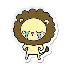 sticker of a crying cartoon lion