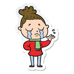 sticker of a cartoon crying woman