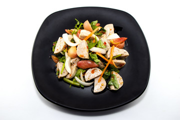 Spicy vietnamese sausages salad  top view on white background