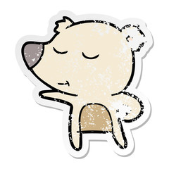 distressed sticker of a happy cartoon bear pointing