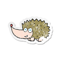 retro distressed sticker of a cartoon hedgehog