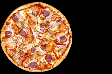 Fresh pizza with meat beaf chicken pork, tomatoes, vegetables, ushrooms on dark black background closeup