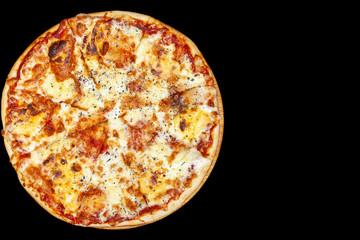 Fresh pizza with meat beaf chicken pork, tomatoes, vegetables, ushrooms on dark black background closeup