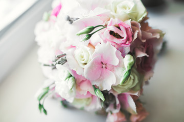 Wonderful luxury wedding bouquet of different flowers