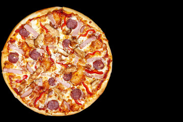Fresh pizza with meat beaf chicken pork, tomatoes, vegetables, ushrooms on dark black background closeup