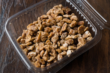 Dried Date Fruit Pieces in Plastic Box Container / Package.