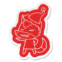 angry wolf cartoon  sticker of a wearing santa hat