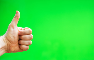 Male hand showing thumbs up. Chroma key. Place for your advertisement.