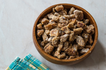 Dried Date Fruit Pieces in Wooden Bowl / Organic Dry Fruit Snacks