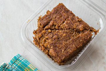 Organic Date Fruit Paste Dough in Plastic Box Container / Package.