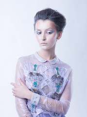 portrait of fashionable woman with stylish hair and evening makeup