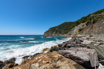 Fototapeta na wymiar Coast and beach in Liguria Italy - Framura Mediterranean Sea