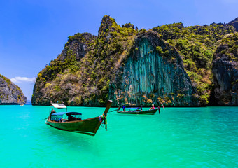 Take a boat to see the beauty of Phi Phi Leh at Pileh Bay and Loh Samah Bay.