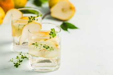 Pear thyme spritzer. Selective focus, space for text.