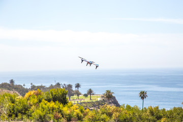 Fototapeta premium Drone in flight near the beach