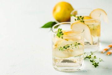 Pear thyme spritzer. Selective focus, space for text.