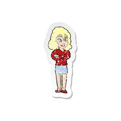 retro distressed sticker of a cartoon woman with crossed arms