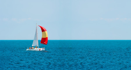 Sailing. Yachting. Tourism. Luxury Lifestyle. Ship yachts with white sails in the open sea.