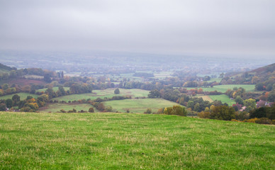 Fototapeta na wymiar Agricultural land for sheep grazing is seen on a foggy day in rural Shropshire, England.
