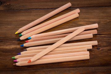 color pencil on wooden background.Crayons. Colored Pencils. colored pencils