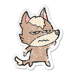 Obraz na płótnie Canvas distressed sticker of a cartoon annoyed wolf