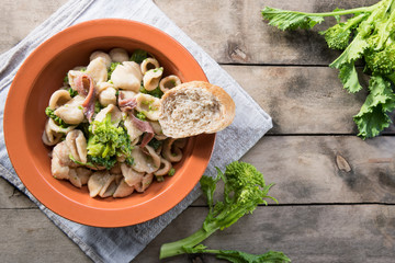 Traditional dish of Apulia region pasta Orecchiette with turnip greens and salted anchovies,...