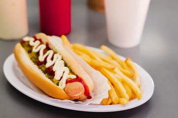 hot dog with potatoes and smoothie