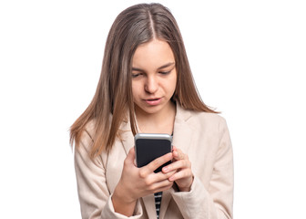 Portrait of beautiful Teen Girl talk to Mobile Phone, isolated on white background. Smiling Child standing and using Cell Phone. Pretty modern Teenager wearing an jacket with Smartphone.