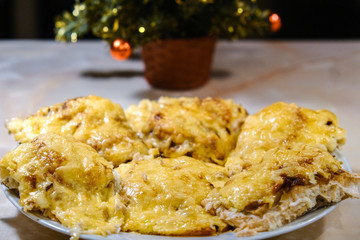 the fried fish fillet in batter in a pan