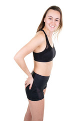 Fototapeta na wymiar Full body portrait of athletic young pretty smiling woman under white background