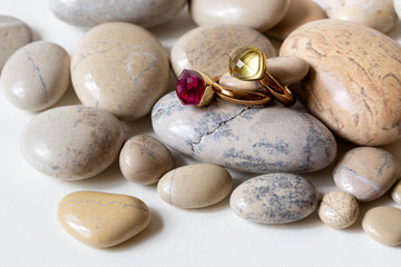 Fototapeta na wymiar Color rings on pebbles stones