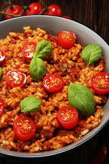 risotto with tomatoes, fresh herbs and parmesan cheese.