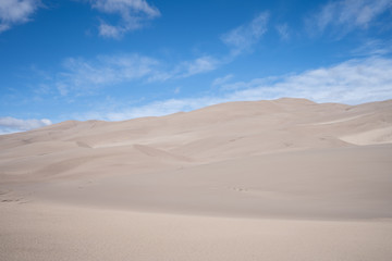 Fototapeta na wymiar Sand Dunes and Clouds