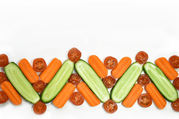 Healthy diet fresh vegetables flat lay border isolated on white. Tomato, carrot, cucumber in decorative composition ornament. Copy space for text horizontal banner template