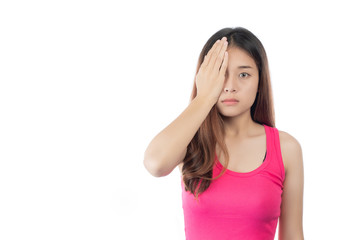 Fototapeta premium The girl wears a pink shirt that is used to close one's eyes. On a white background