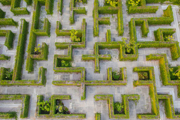 Aerial photo top view medium altitude above of maze green park garden