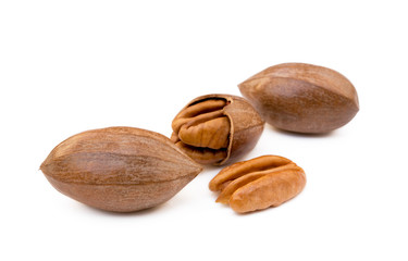 Fresh pecan nuts isolated on a white background