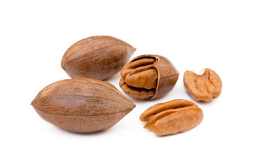 Fresh pecan nuts isolated on a white background