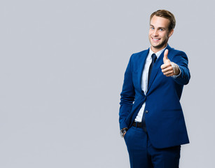 businessman with thumbs up gesture