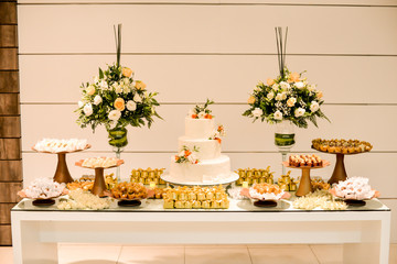 wedding candy table. delicious and assorted sweets. selective focus.